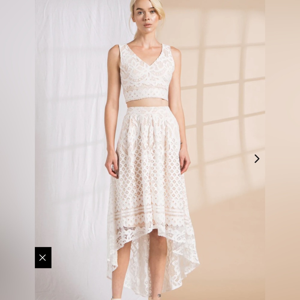Two piece white and beige lined lace skirt and top set